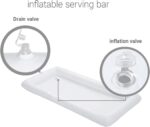 Two white BCWATERFUNPD inflatable serving bars filled with ice, drinks, and snacks at an outdoor party setting.