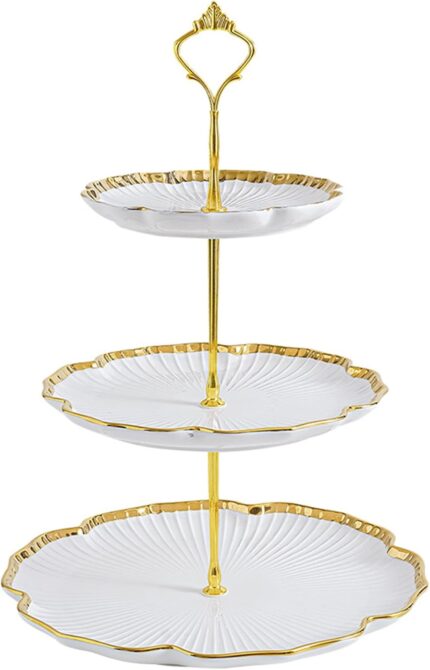 Elegant BPFY 3-tier porcelain serving tray with gold trim and embossed floral design, holding cupcakes and pastries.