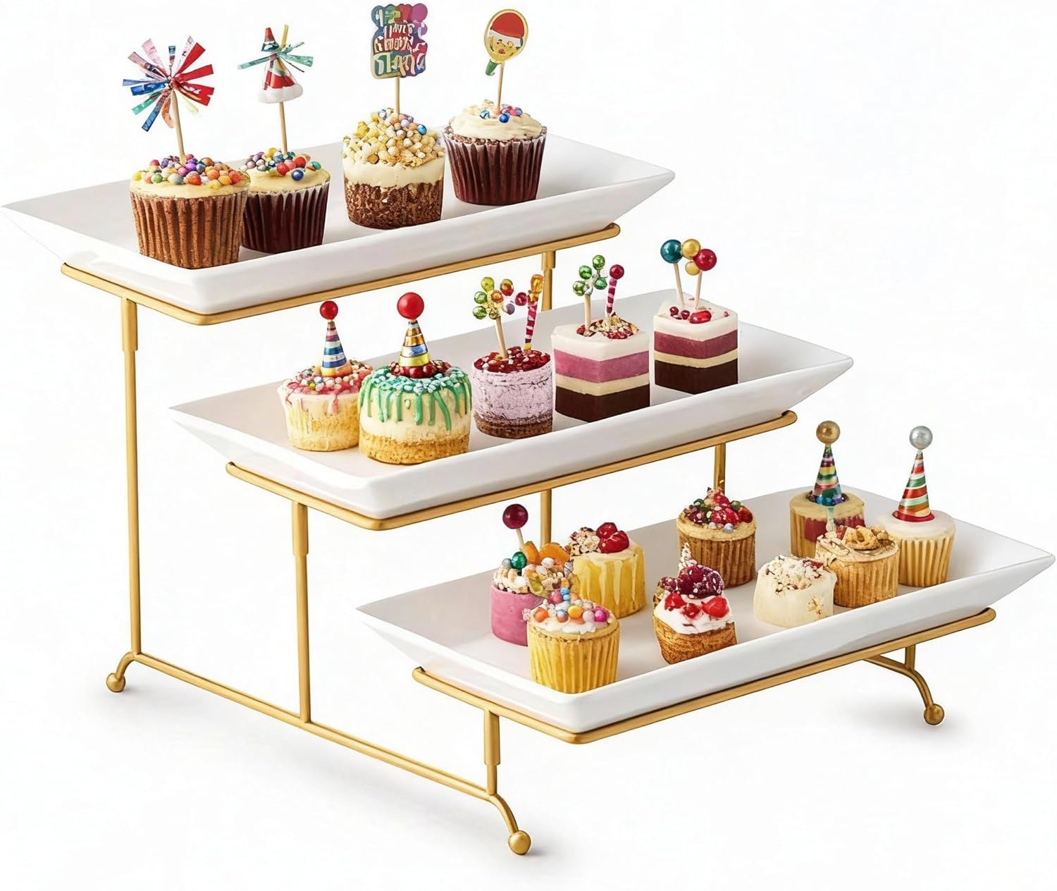 gomakren-3-tier-gold-serving-stand-with-white-porcelain-platters-14-inch-01 A three-tier Gomakren serving stand with gold frame and white rectangular porcelain platters, displaying various desserts.
