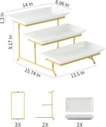 A three-tier Gomakren serving stand with gold frame and white rectangular porcelain platters, displaying various desserts.
