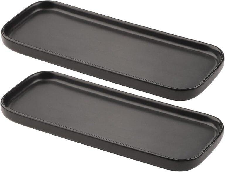 Two black rectangular ceramic trays by VanEnjoy, ideal for organizing soap bottles and toiletries on a bathroom or kitchen co