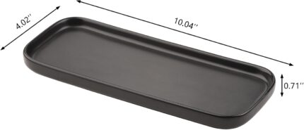 Two black rectangular ceramic trays by VanEnjoy, ideal for organizing soap bottles and toiletries on a bathroom or kitchen co
