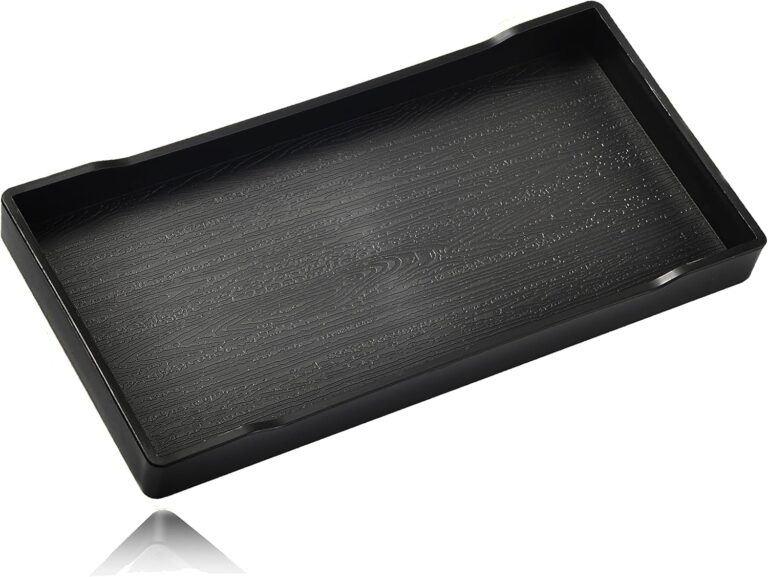 A sleek, small black rectangular plastic tray from VCREATC, ideal for organizing soaps or vanity items on a countertop.